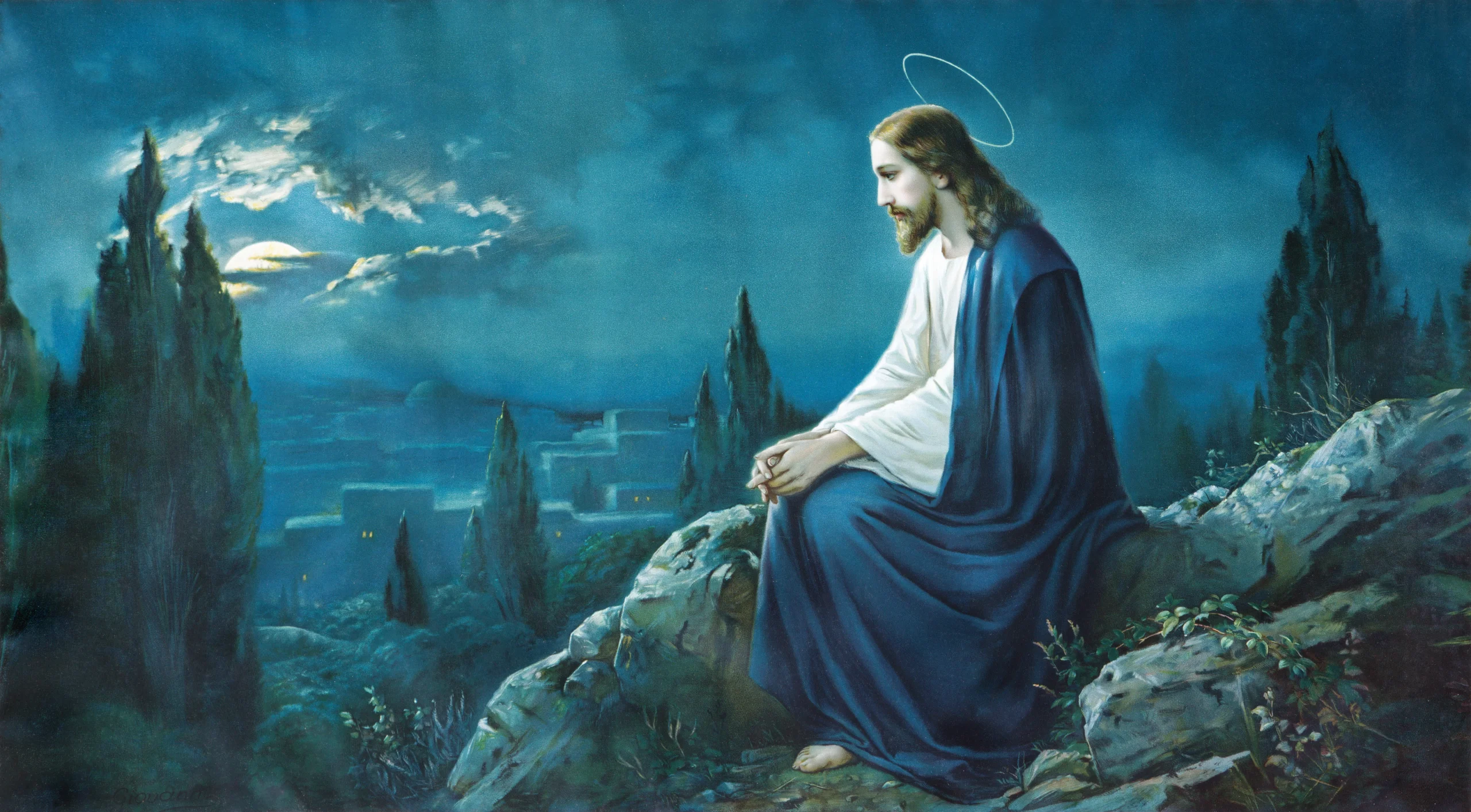 Jesus praying alone on a hillside at night